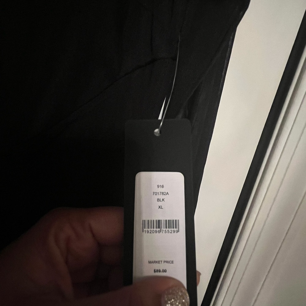 bebe sheer lined black, cocktail dress in size XL. - Picture 4 of 5
